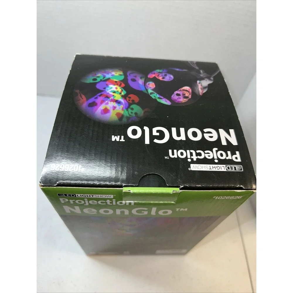 Gemmy‎ Halloween LED Projection NeonGlo Skulls #1026626 Orange/Purple/Green